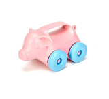Green toys - Cerdito con ruedas rosado